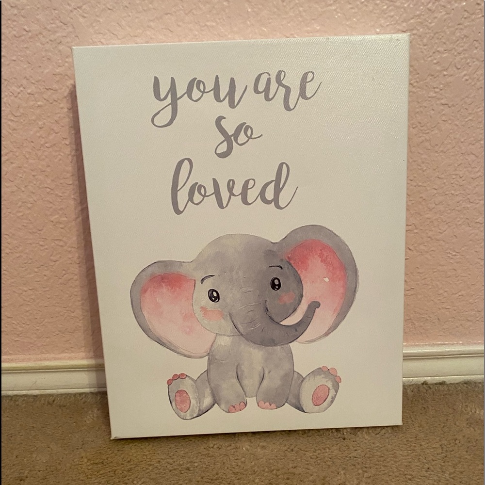 “You are so loved “ sign.